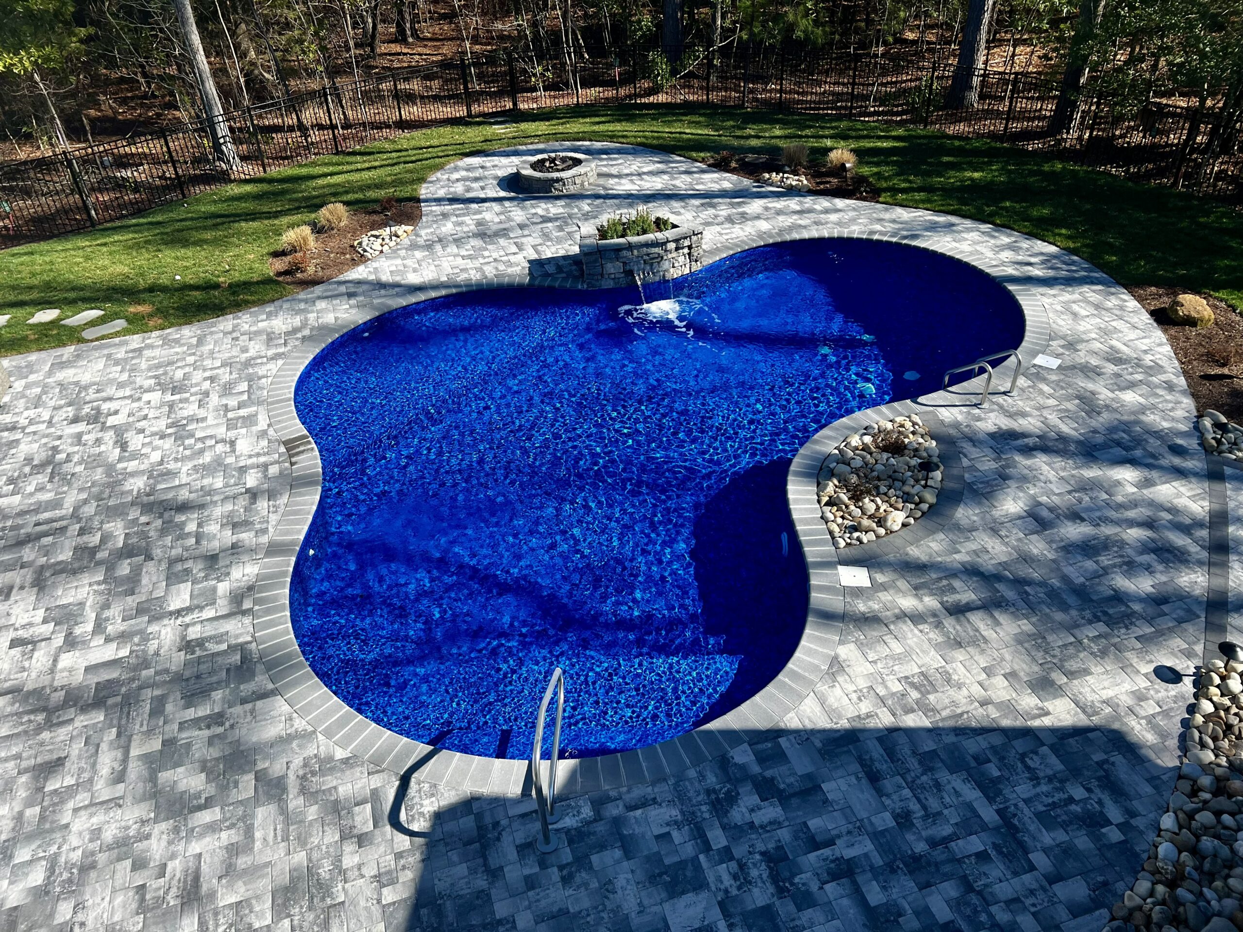 in-ground pool blue water